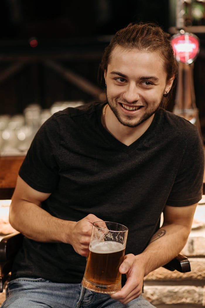 A Man Having a Draft Beer